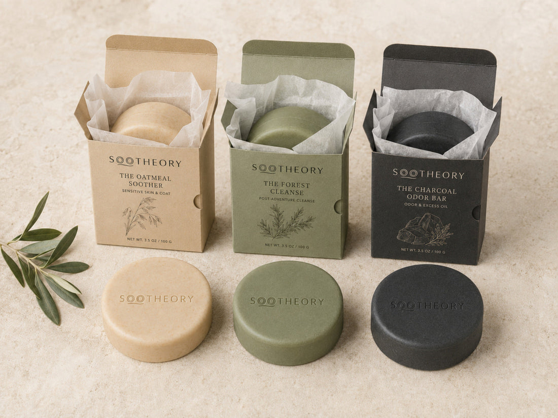 Three SOOTHEORY solid dog shampoo bars with open paper packaging