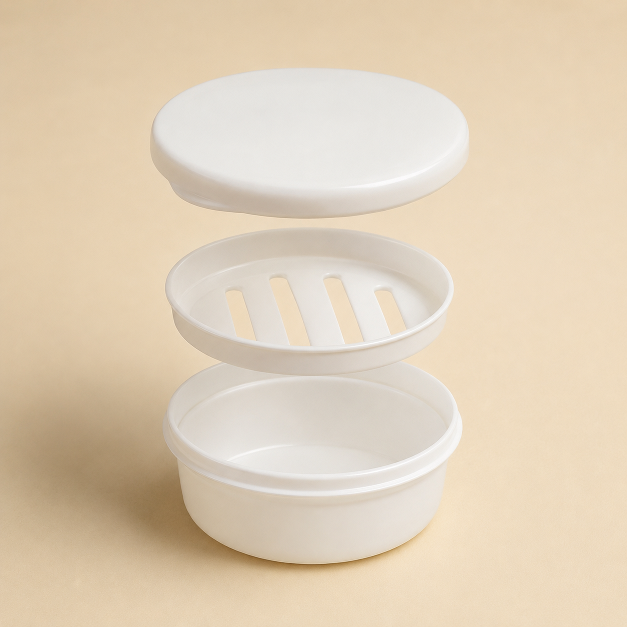 Three-part round shampoo bar case with removable drainage insert